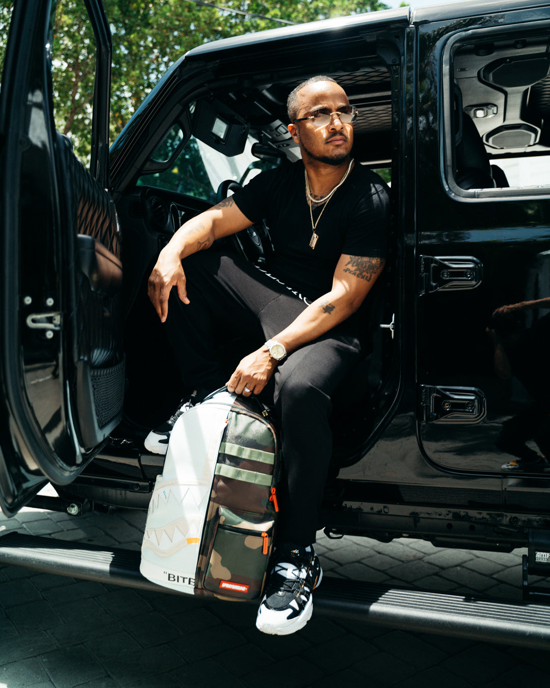 SPRAYGROUND® BACKPACK SPLIT WEIRD BACKPACK (DLXV)