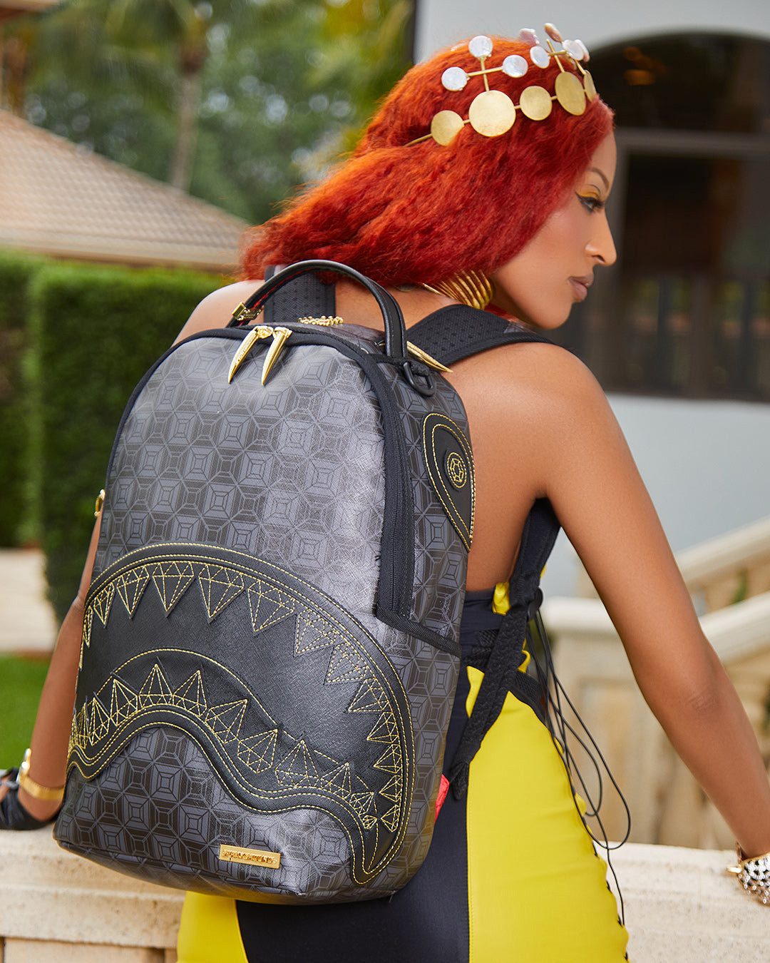 SPRAYGROUND® BACKPACK OBSIDIAN STUNNER A.i.6 SANDFLOWER COLLAB BACKPACK (DLXV)