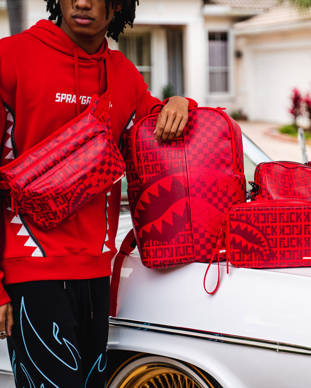 sprayground backpack red