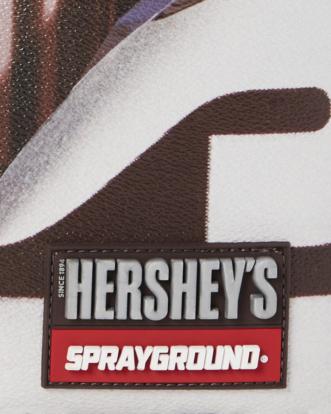 Sprayground Reese's Peanut Butter Cup Shark Bite Backpack