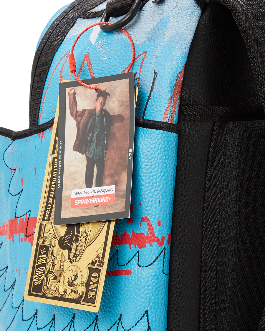 SPRAYGROUND® BACKPACK OFFICIAL BASQUIAT UNTITLED (FALLEN ANGEL) 1981 WING BACKPACK (DLXV)