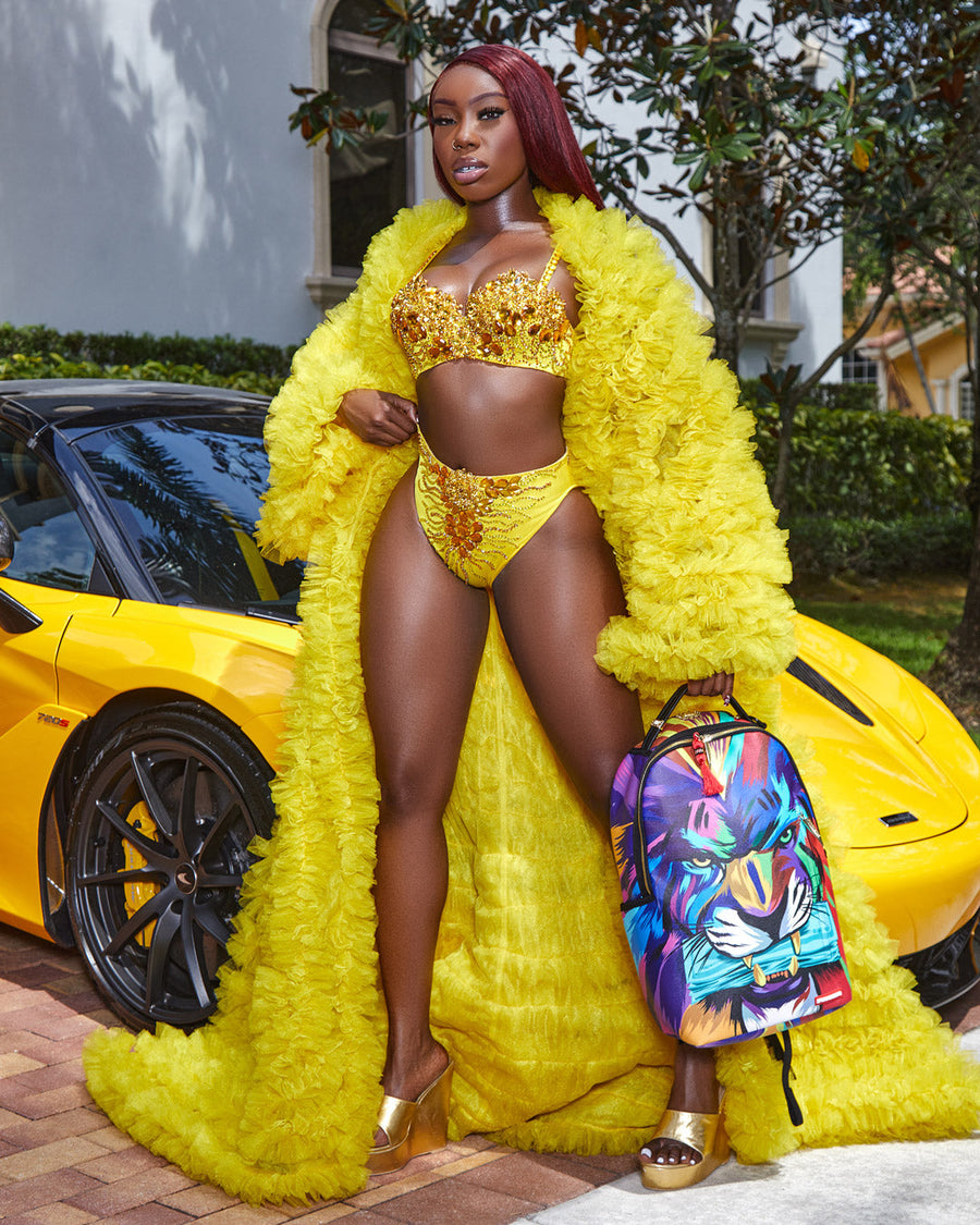 SPRAYGROUND® BACKPACK HEAR MY ROAR A.i.6 SANDFLOWER COLLAB BACKPACK (DLXV)