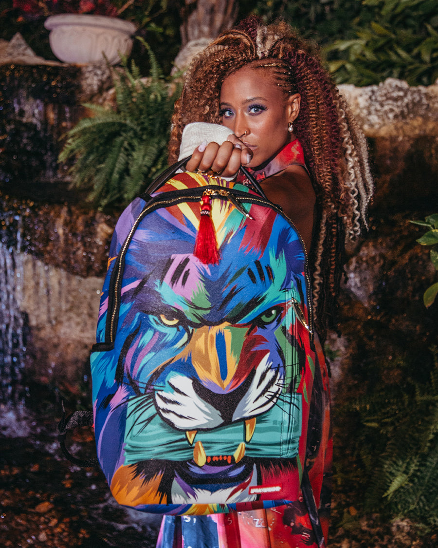 SPRAYGROUND® BACKPACK HEAR MY ROAR A.i.6 SANDFLOWER COLLAB BACKPACK (DLXV)