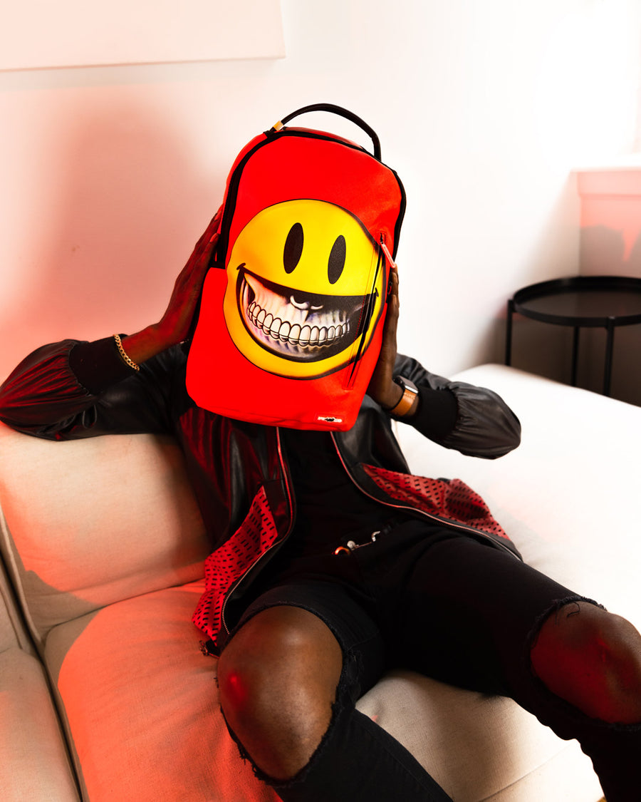 SPRAYGROUND® BACKPACK SMILE BIG GRIN RON ENGLISH COLLAB