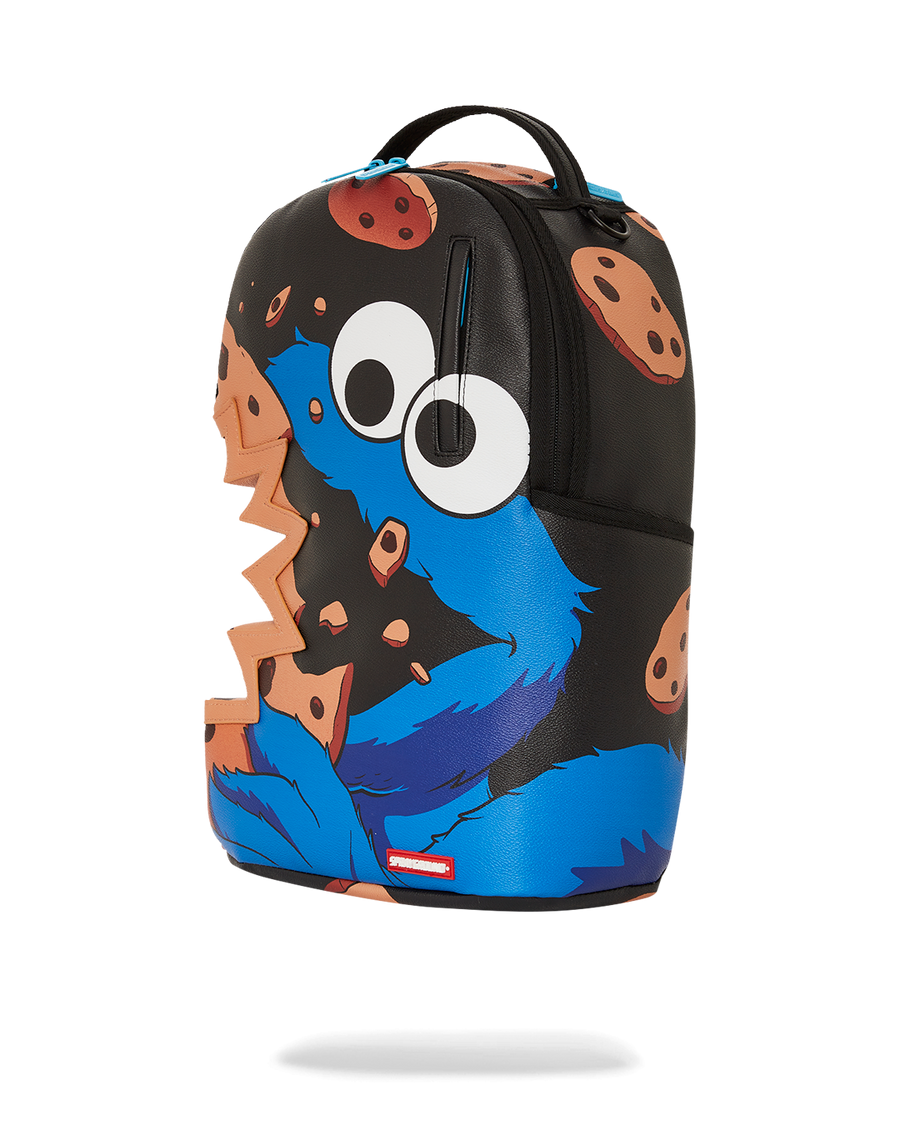 SPRAYGROUND® BACKPACK COOKIE MONSTER COOKIE SHARKBITE BACKPACK (DLXV)