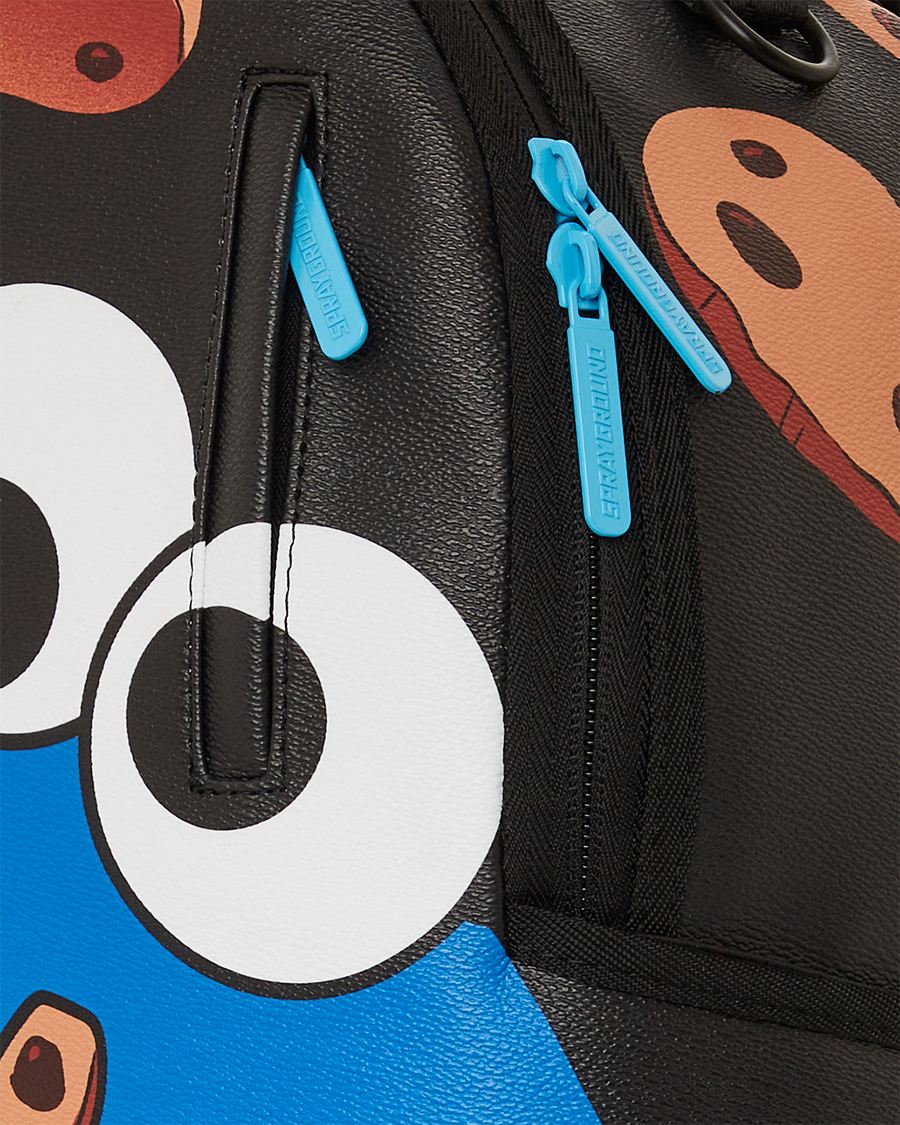 SPRAYGROUND® BACKPACK COOKIE MONSTER COOKIE SHARKBITE BACKPACK (DLXV)