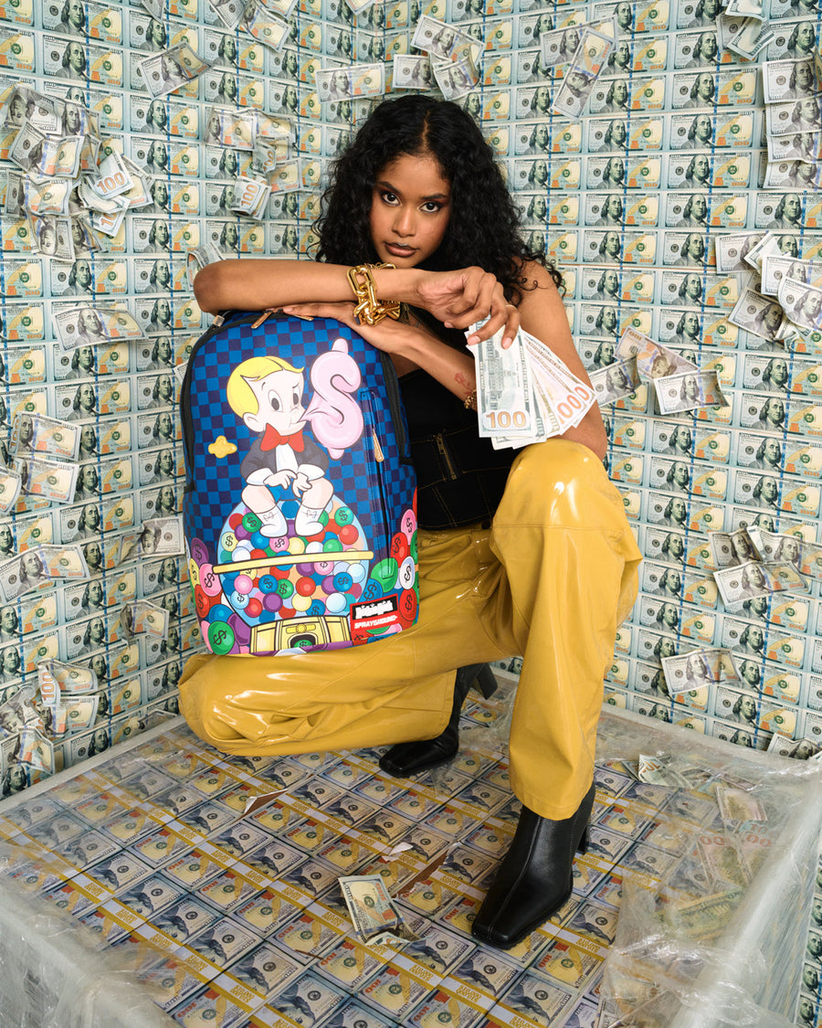 SPRAYGROUND® BACKPACK RICHIE RICH MONEY MONEY MONEY BACKPACK (DLXV)