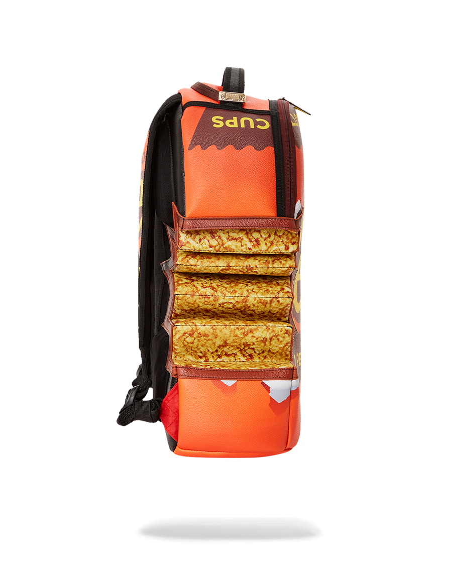 SPRAYGROUND® BACKPACK REESE'S SHARK BITE BACKPACK (DLXV)