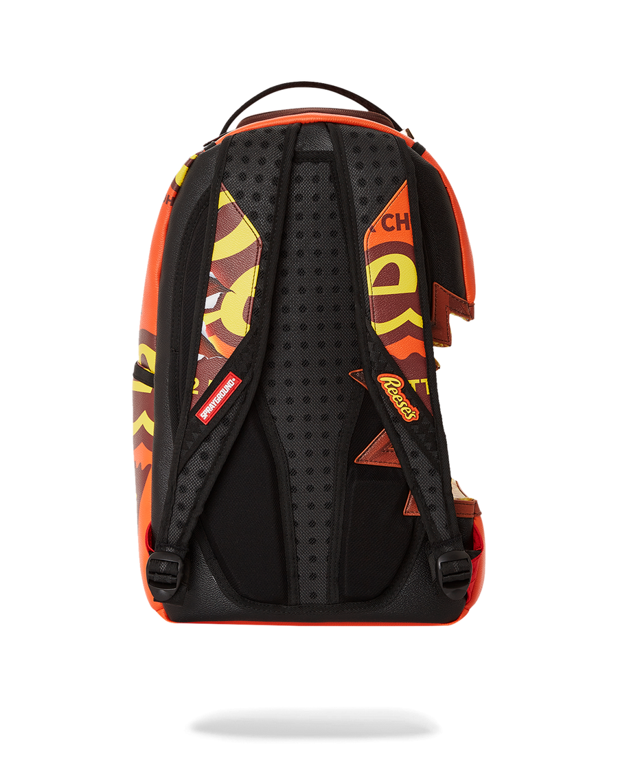 SPRAYGROUND® BACKPACK REESE'S SHARK BITE BACKPACK (DLXV)