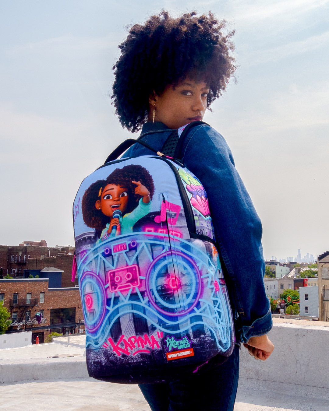 KARMA'S WORLD TURN UP THE VOLUME BACKPACK