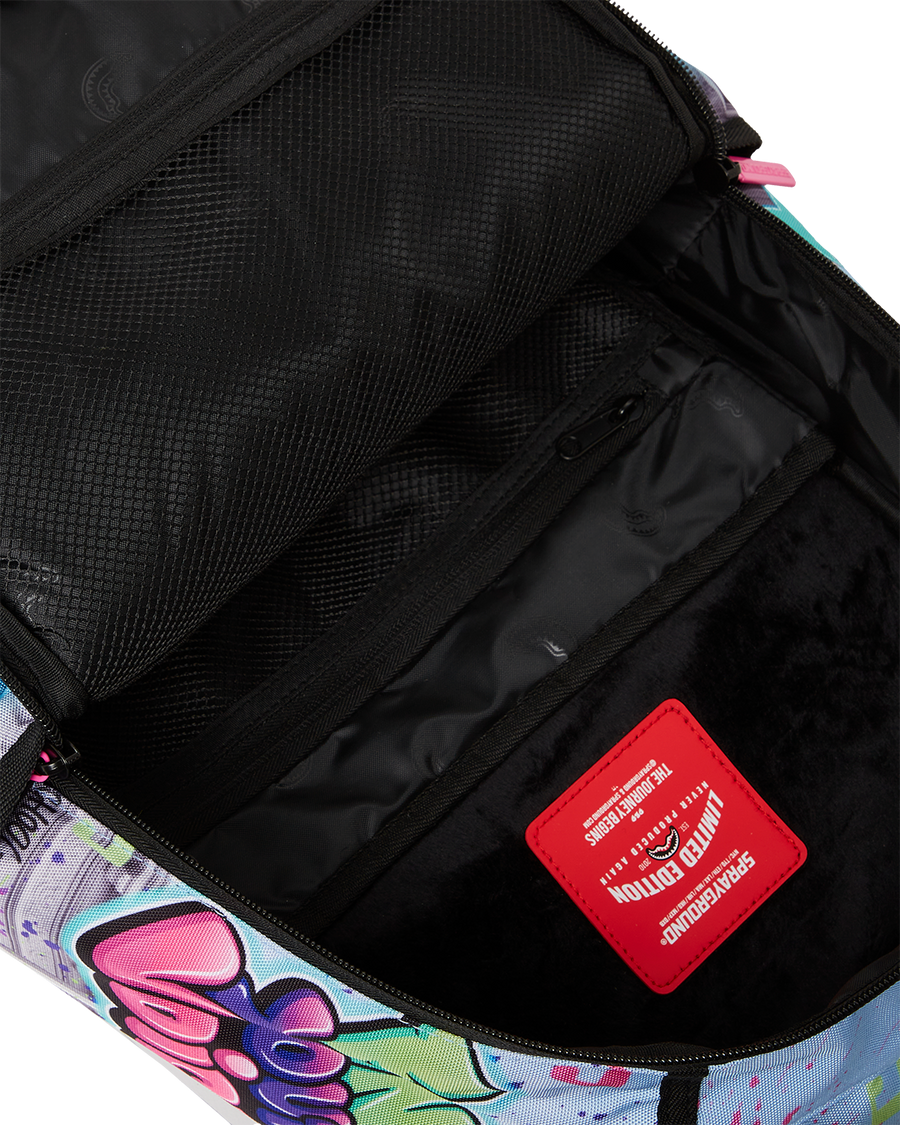 SPRAYGROUND® BACKPACK KARMA'S WORLD TURN UP THE VOLUME BACKPACK