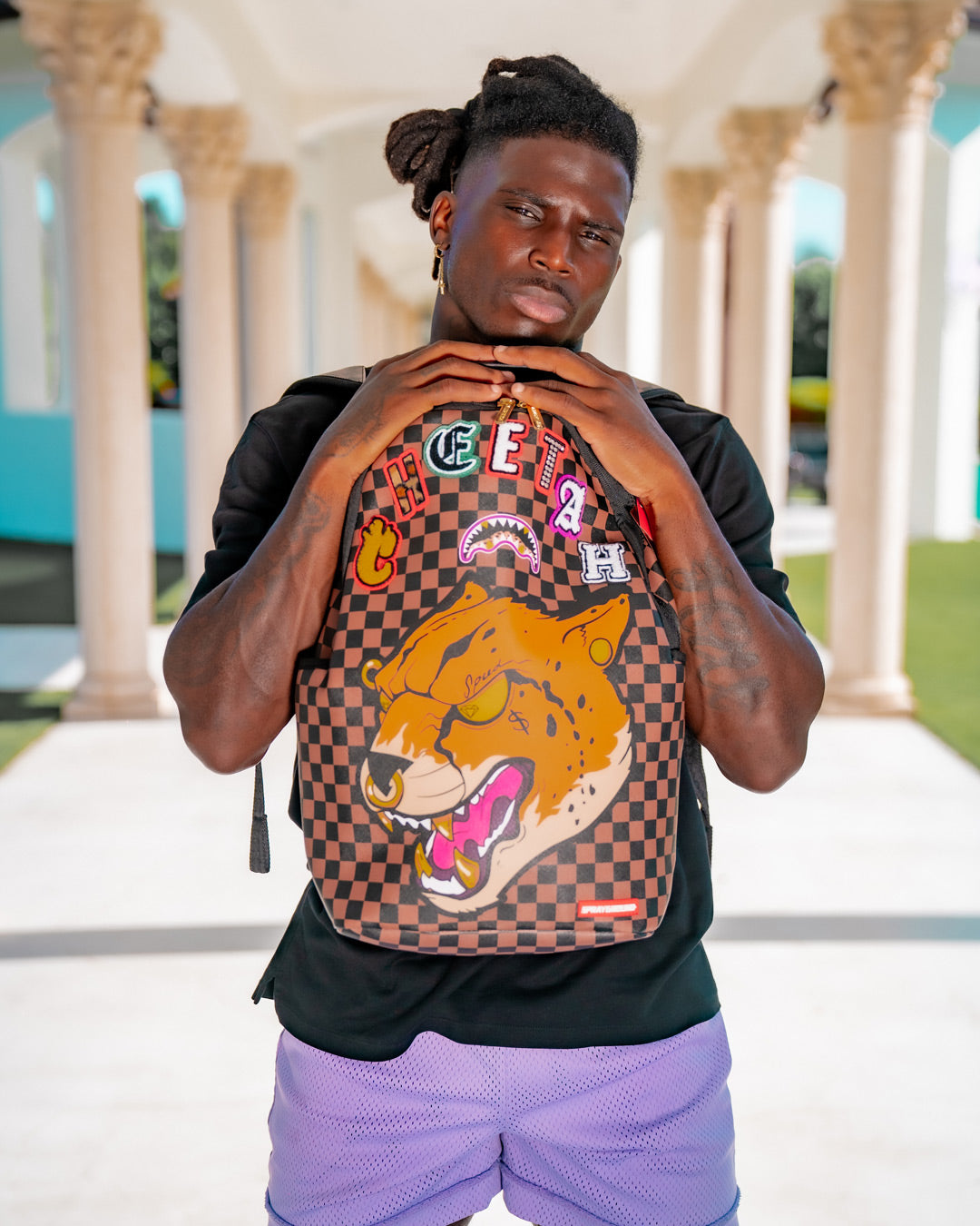 Sprayground cheetah backpack deals