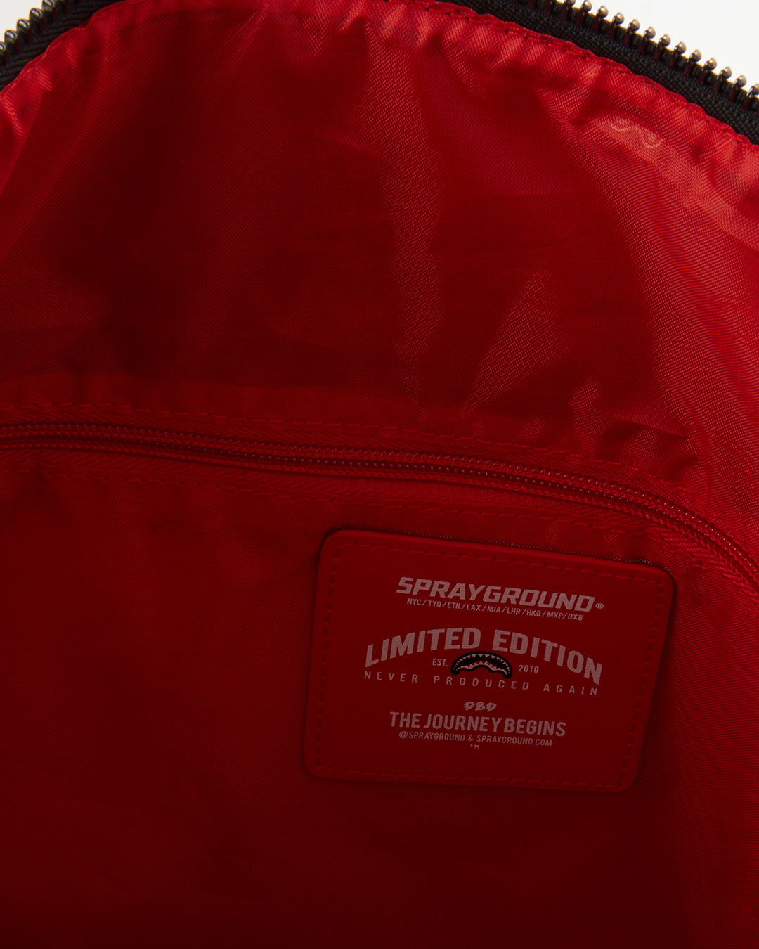 SPRAYGROUND® DUFFEL MONEY CAMO (RED) DUFFLE