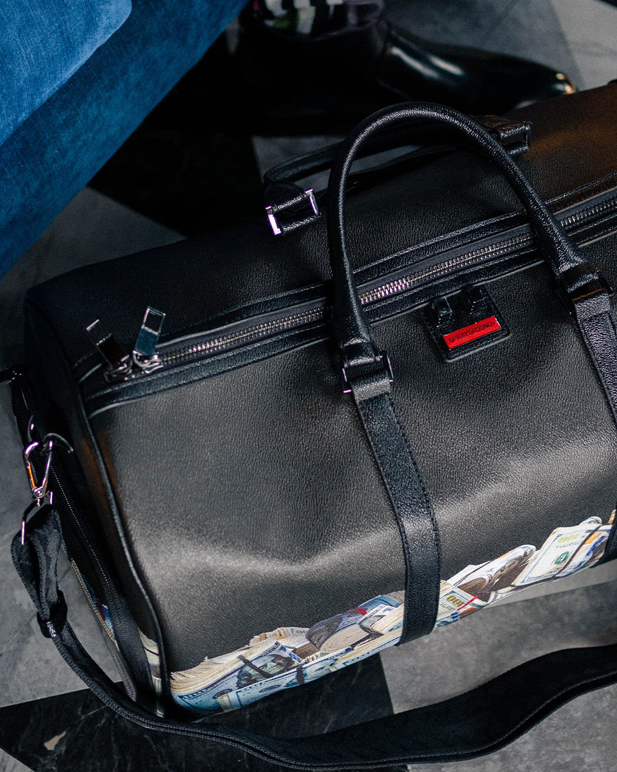 SPRAYGROUND® DUFFLE $HARKBITE LARGE DUFFLE