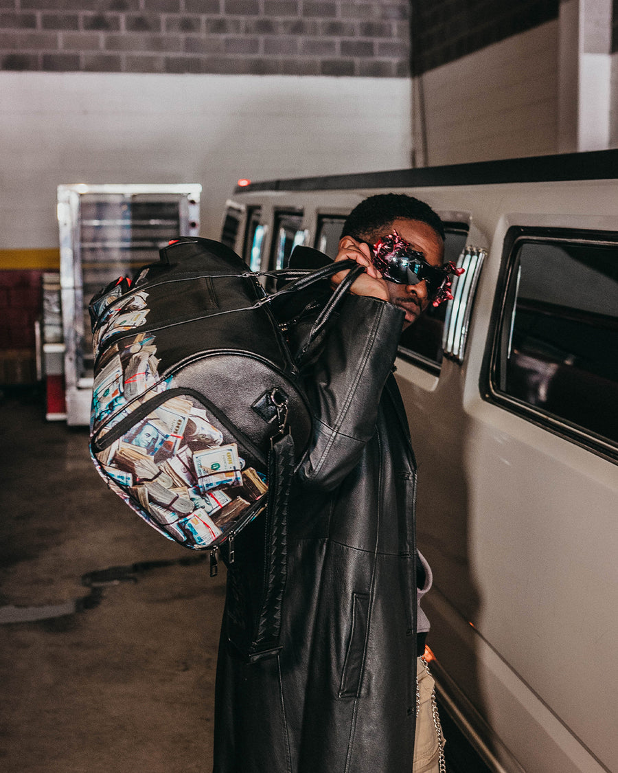 SPRAYGROUND® DUFFLE $HARKBITE LARGE DUFFLE