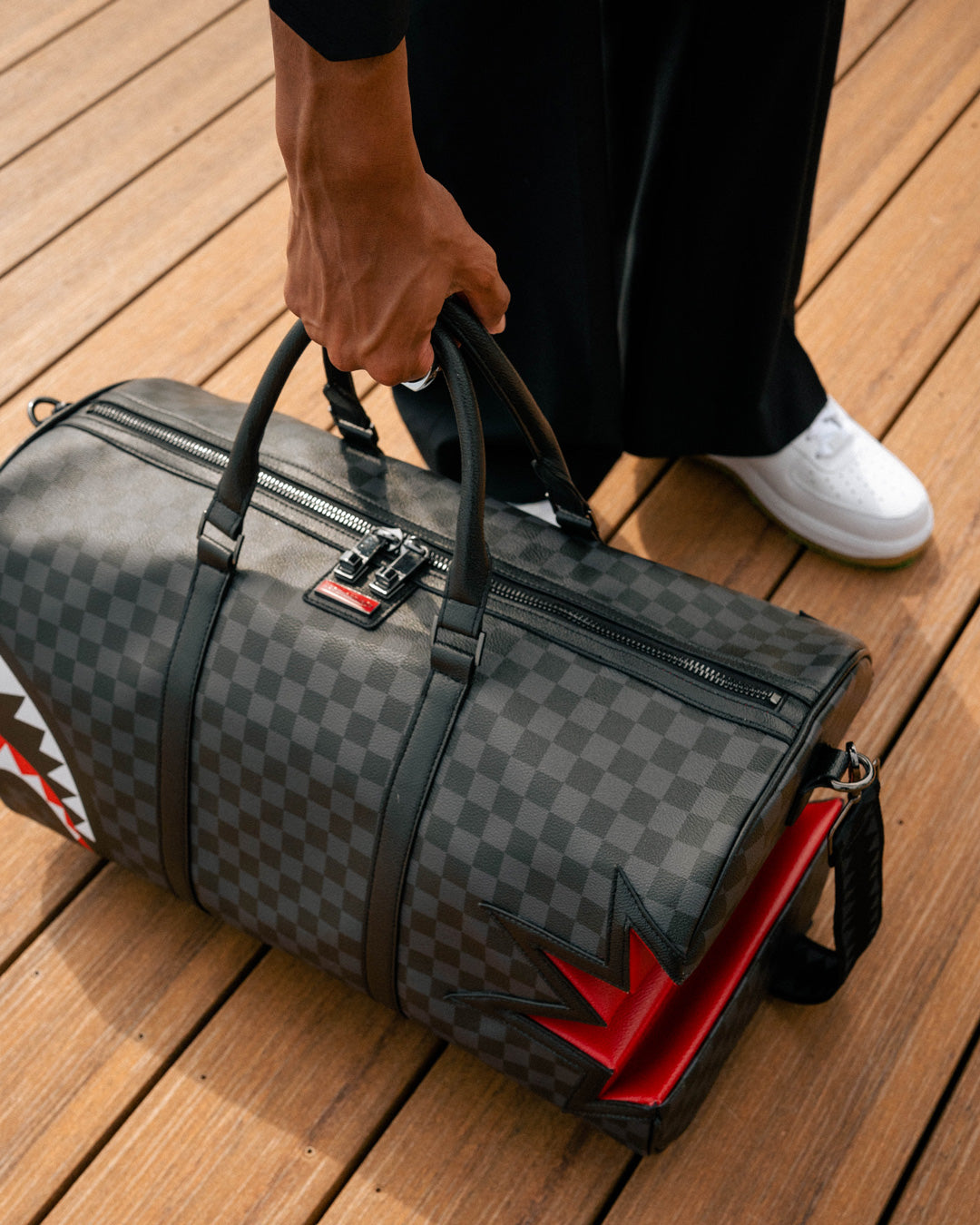 sprayground duffle bag money