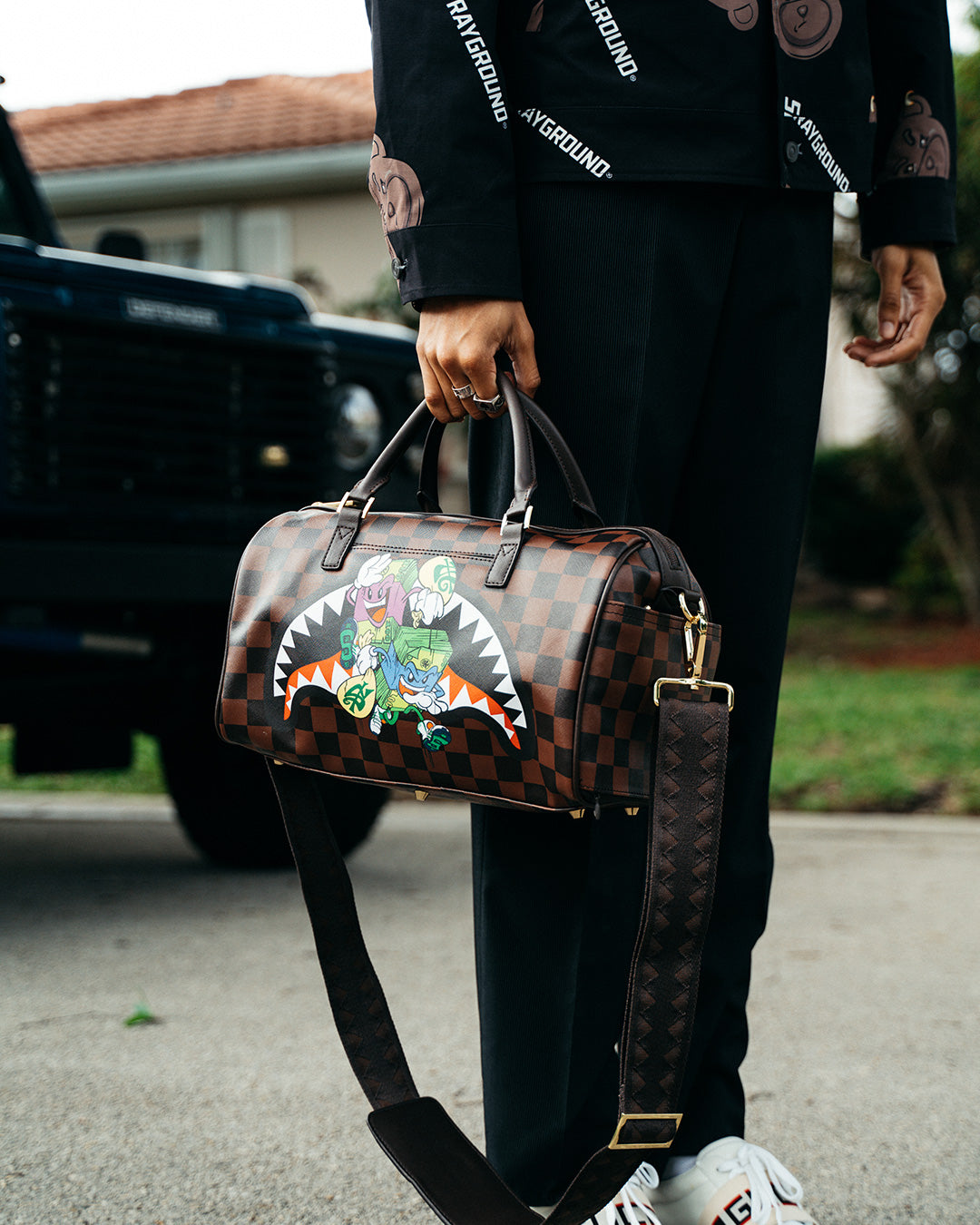 SPRAYGROUND® MINI DUFFLE MONEY CHASER MINI DUFFLE