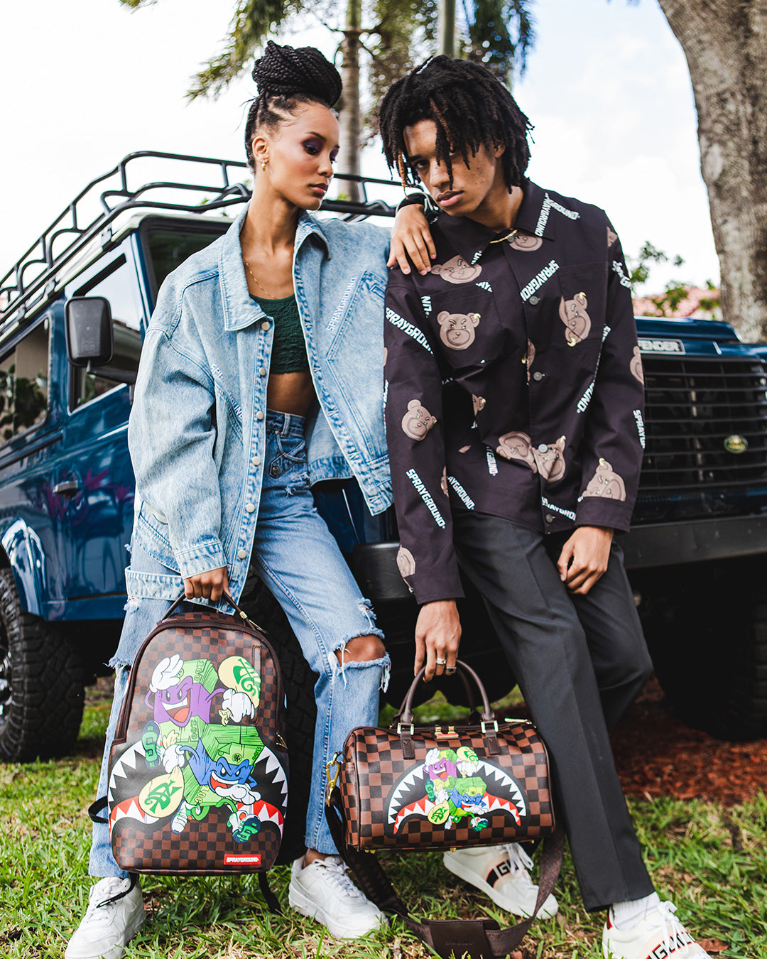 SPRAYGROUND® MINI DUFFLE MONEY CHASER MINI DUFFLE