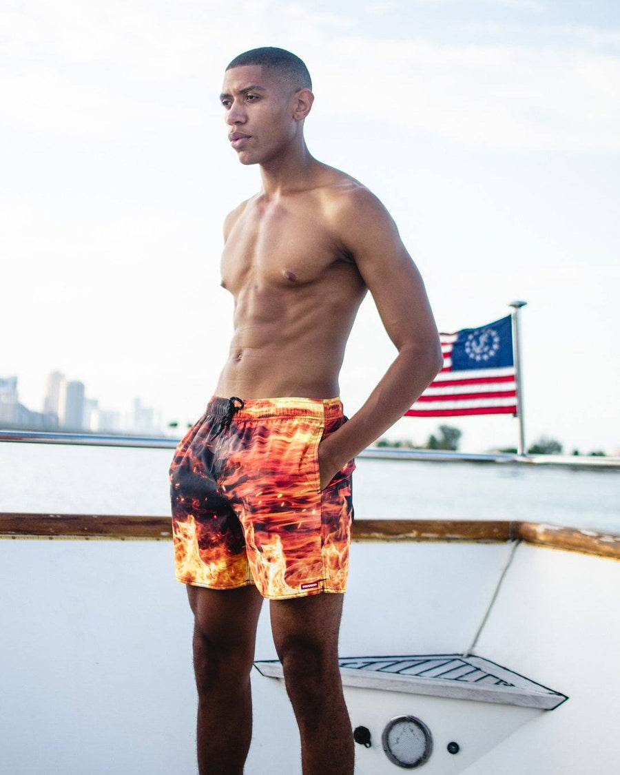 SPRAYGROUND® SWIM CAMO FIRE SHOTO SWIM TRUNKS