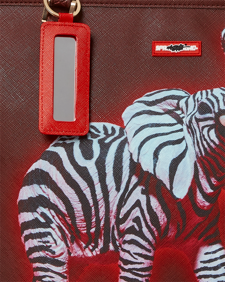 SPRAYGROUND® TOTE ZEBRA ELEPHANT RON ENGLISH COLLAB TOTE